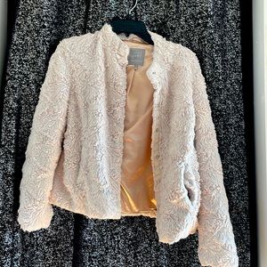 A white fleece jacket.